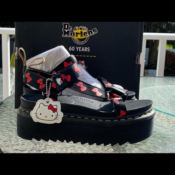 Dr. Martens Shoes - VEGAN DR. MARTENS & HELLO KITTY PLATFORM SANDALS
Size Women’s US 9